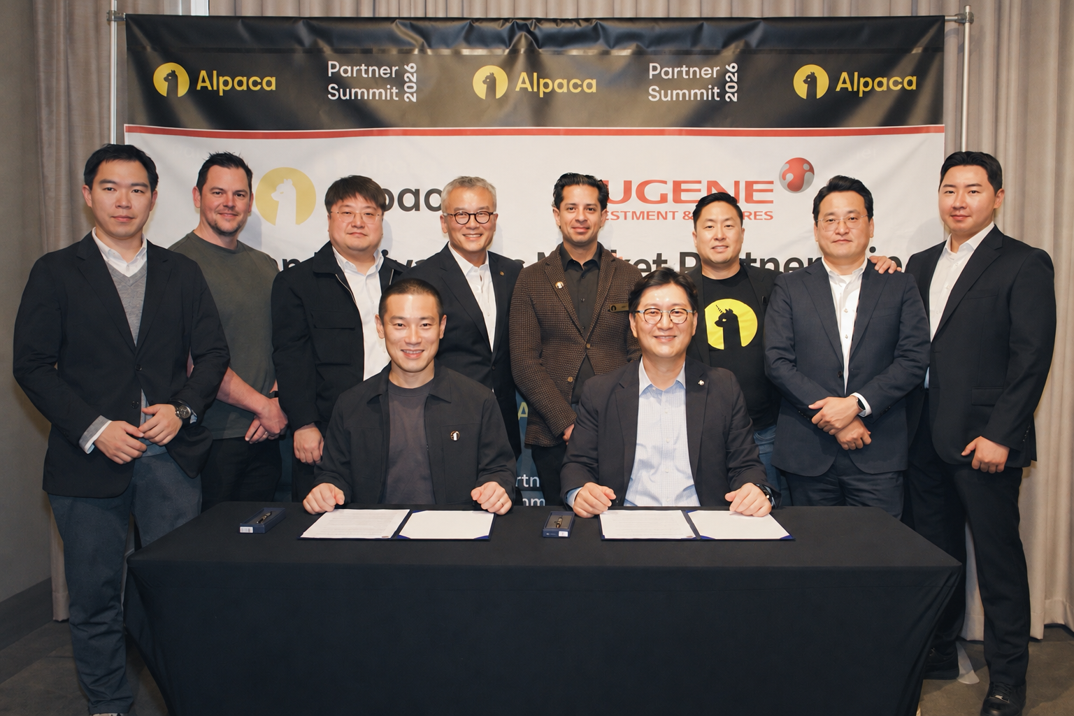 Members of Eugene Investment & Futures and Alpaca gather for a photo at the signing of the MOU.