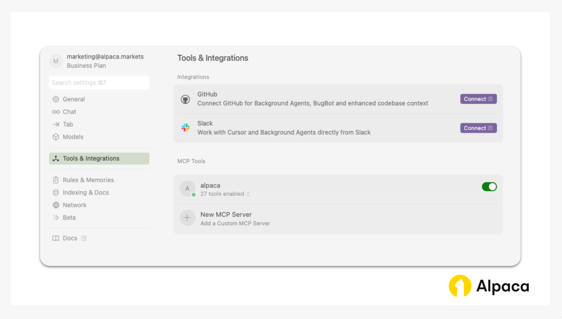 Screenshot of Cursor’s Tools & Integrations settings. GitHub and Slack are shown as optional integrations. Under MCP Tools, Alpaca is listed with 27 tools enabled, and there is an option to add a new custom MCP Server. Toggle switch indicates Alpaca integration is active.
